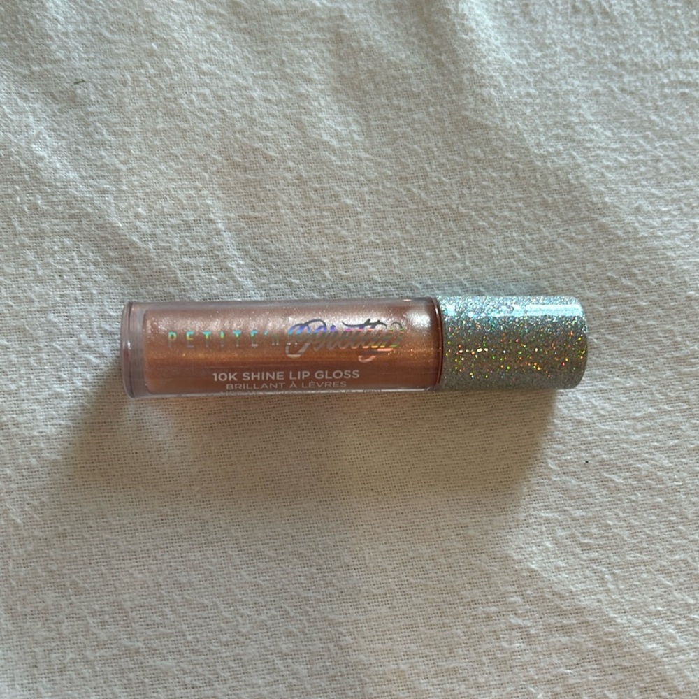 Never used before pink, shiny lipgloss